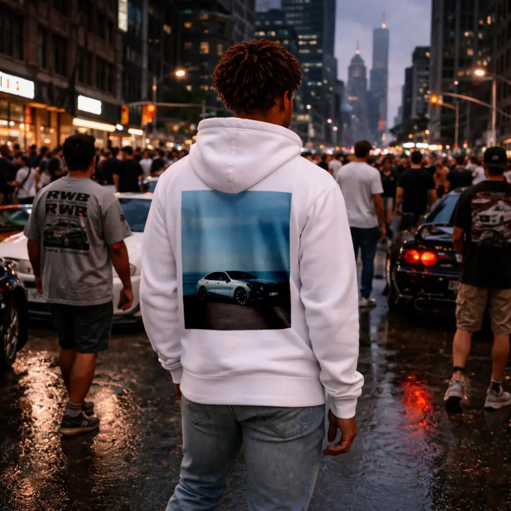 BMW i5 Sedan Parked by the Ocean – Hoodies