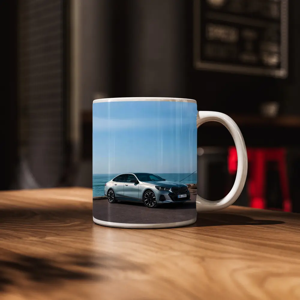 BMW i5 Sedan Parked by the Ocean – Mugs