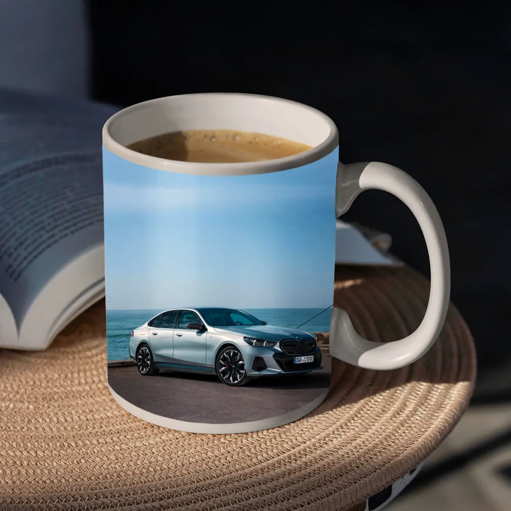 BMW i5 Sedan Parked by the Ocean – Mugs