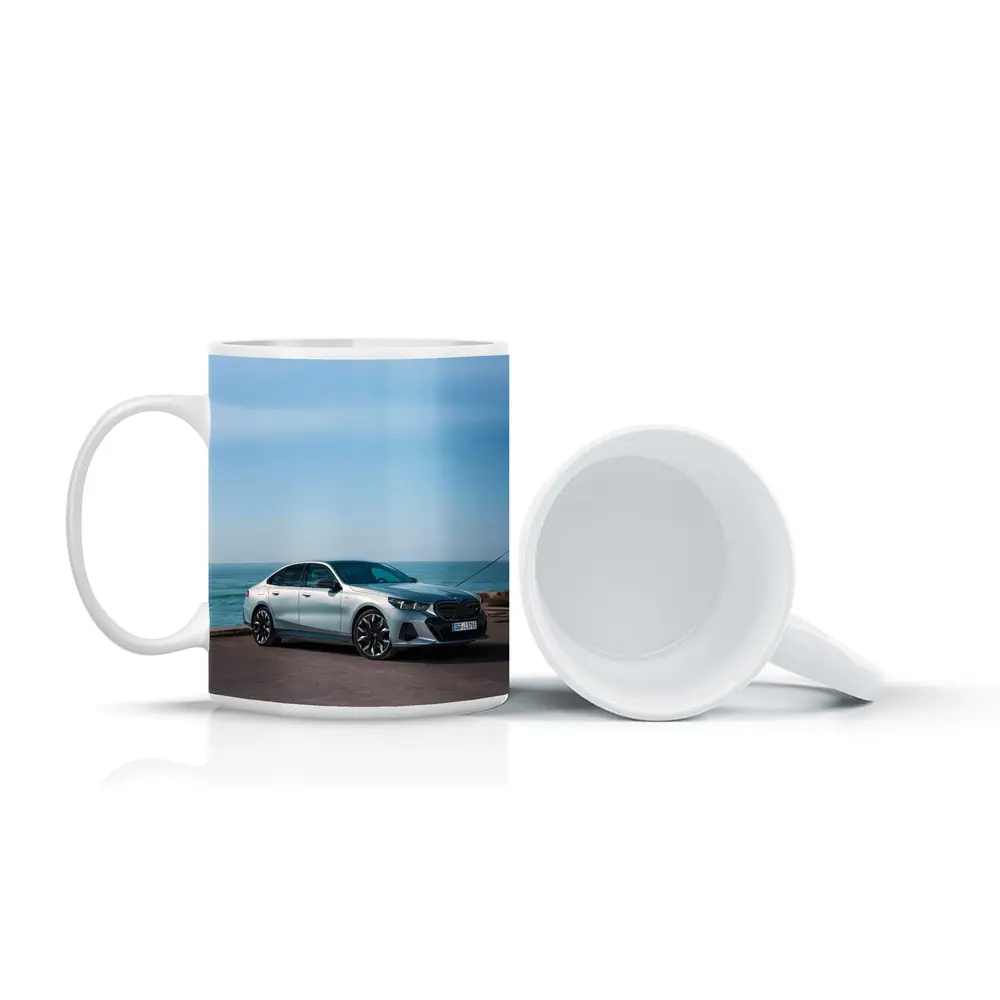 BMW i5 Sedan Parked by the Ocean – Mugs