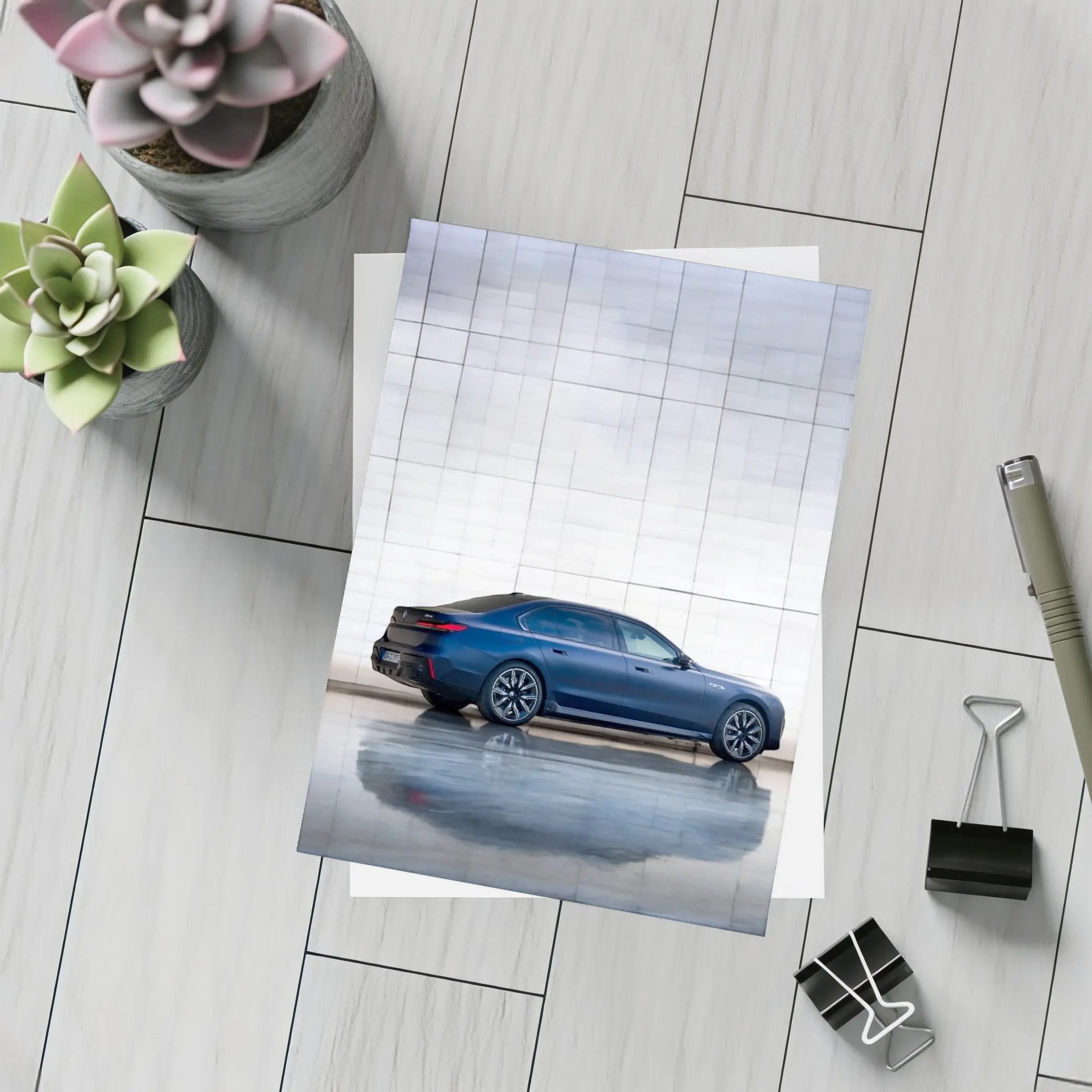 BMW i7 Blue Sedan Against Silver Wall – Postcards