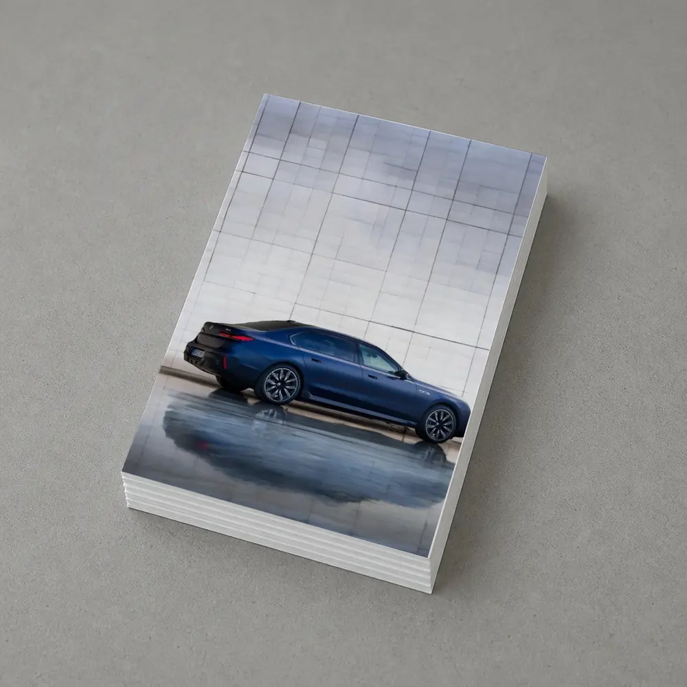BMW i7 Blue Sedan Against Silver Wall – Postcards