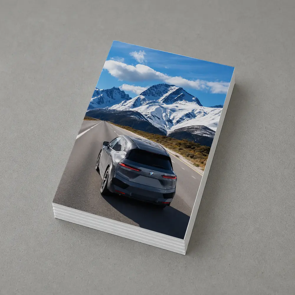 BMW iX SUV on Mountain Road – Postcards