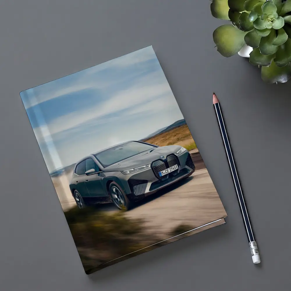 BMW iX Driving Dusty Desert Road – Notebooks