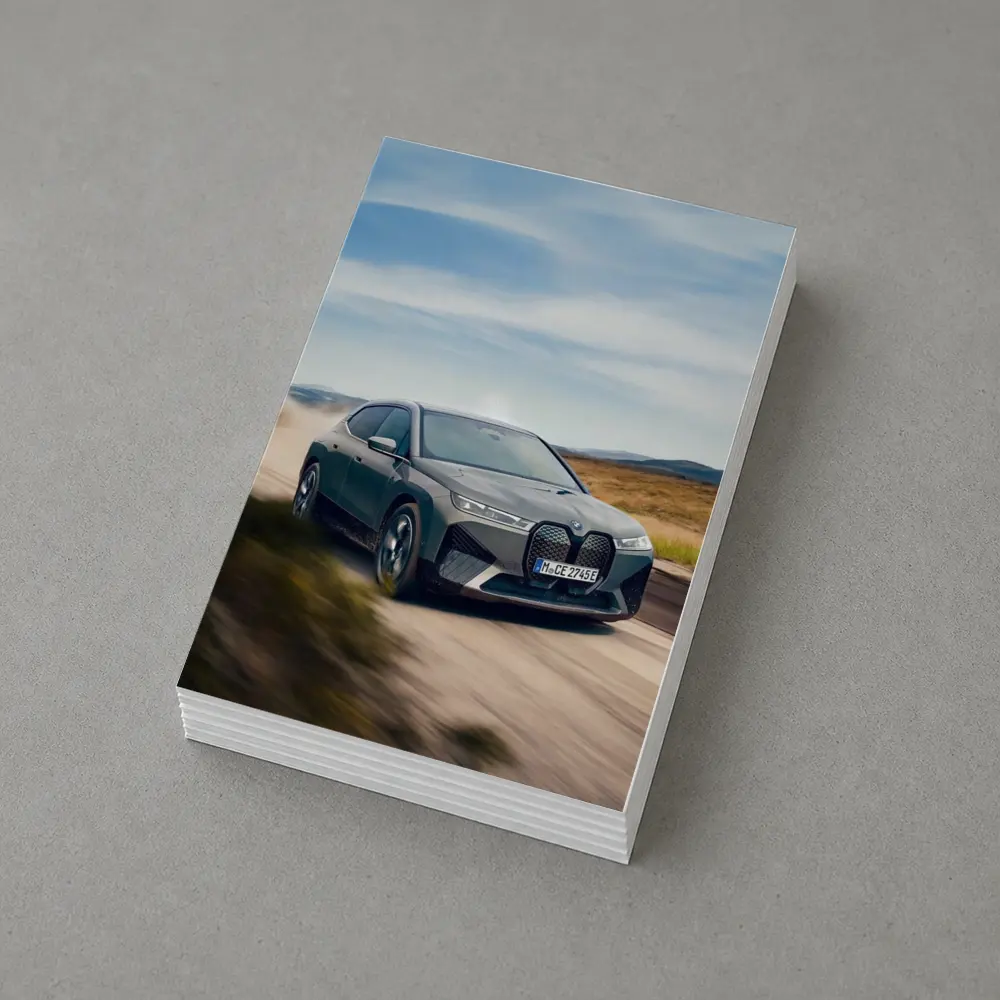 BMW iX Driving Dusty Desert Road – Postcards