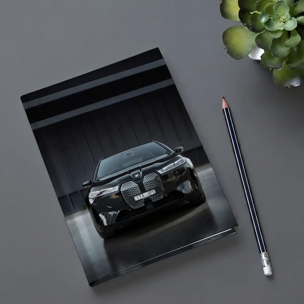 BMW iX Black Front View Dark Garage – Notebooks