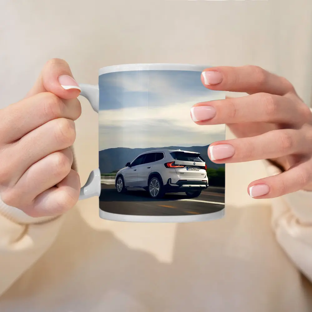 BMW iX1 SUV Driving Mountain Road – Mugs