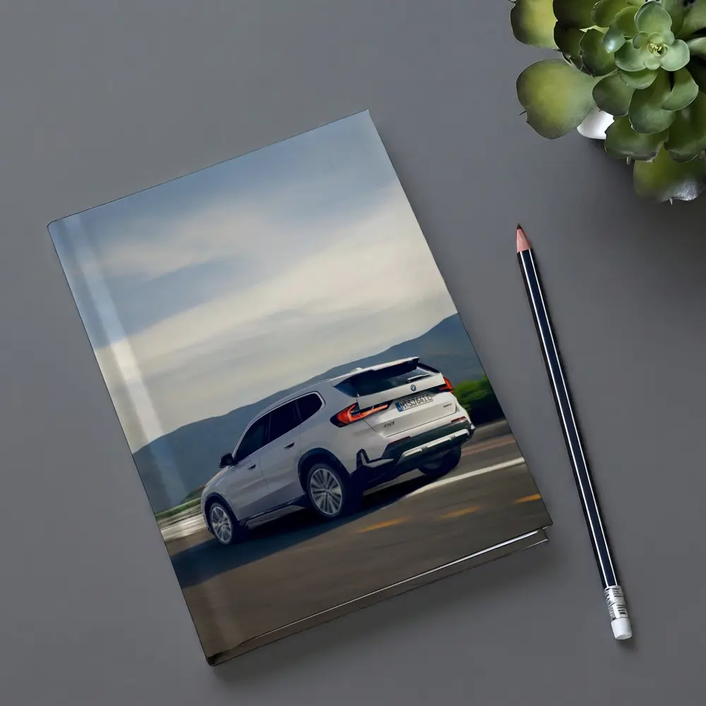 BMW iX1 SUV Driving Mountain Road – Notebooks