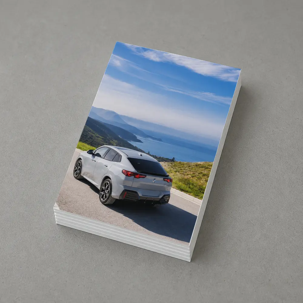 BMW iX2 Grey Rear Coastal Mountain Road – Postcards