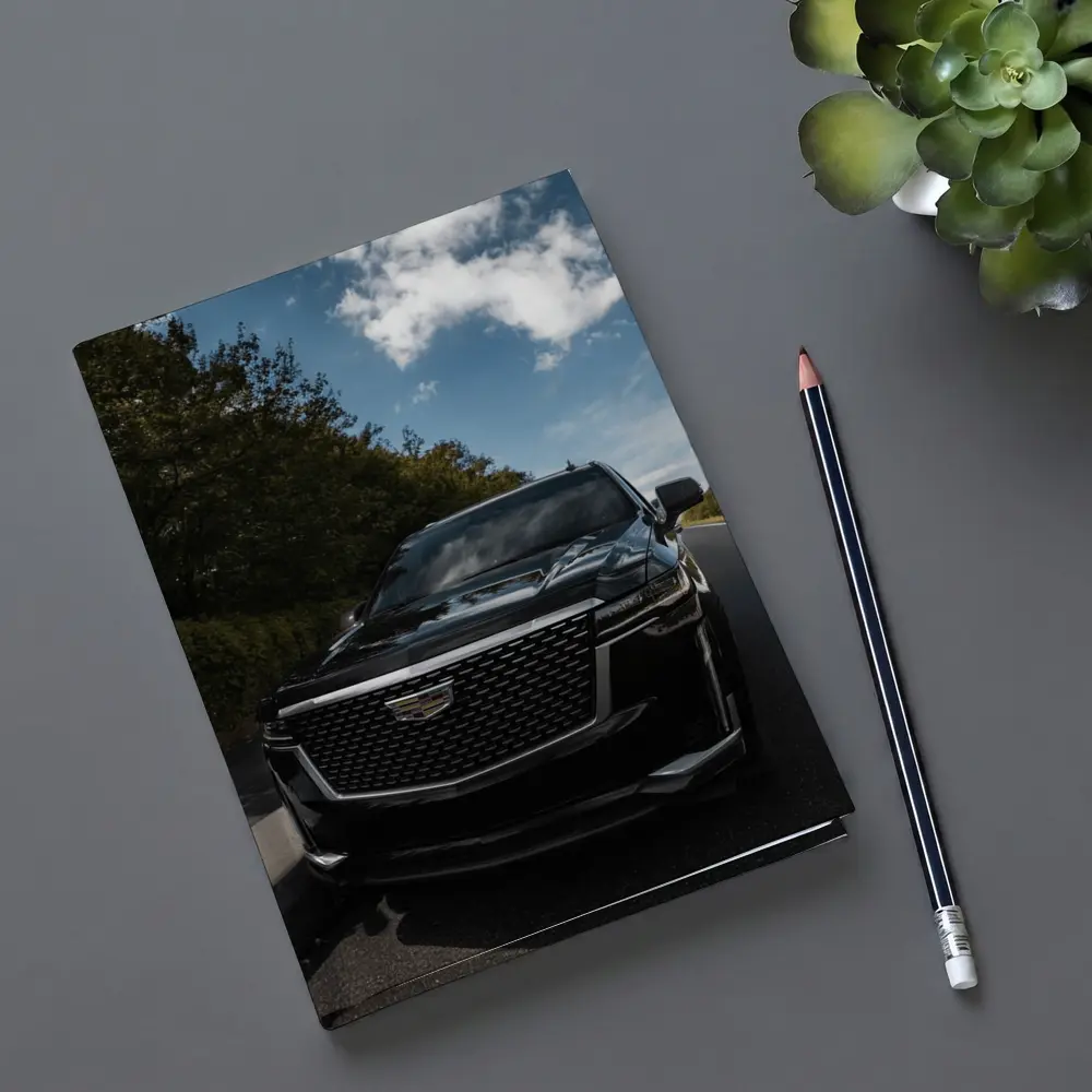 Black Cadillac Escalade on Open Road – Notebooks