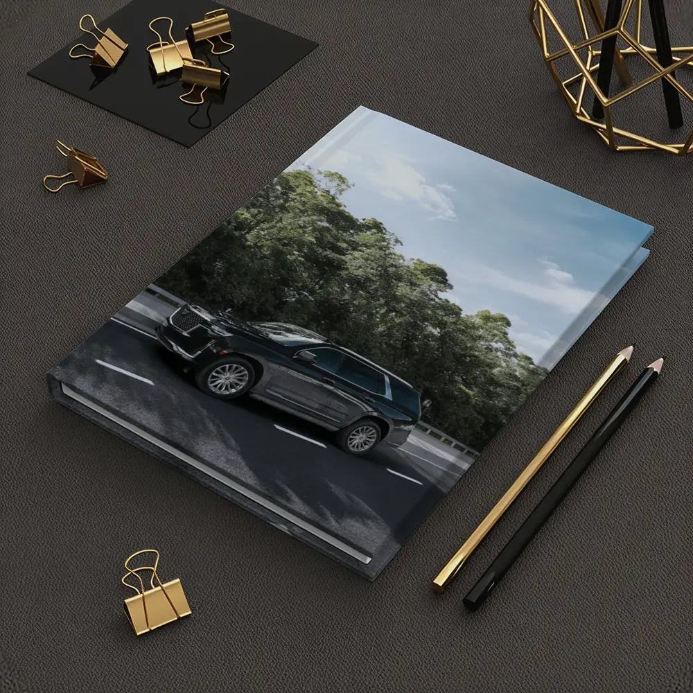 Black Cadillac Escalade SUV On Highway – Notebooks