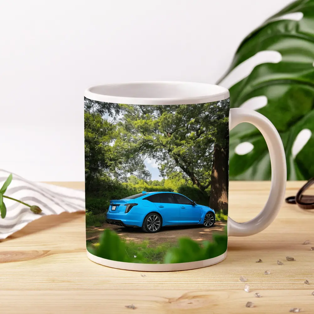 Cadillac CT5 Blue Parked Forest Setting – Mugs