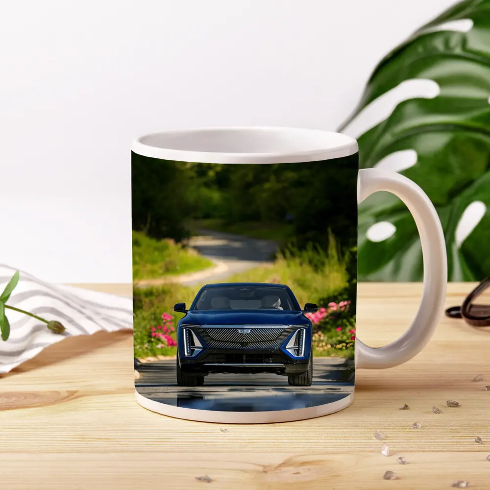 Cadillac Lyriq Blue Front View Green Park – Mugs