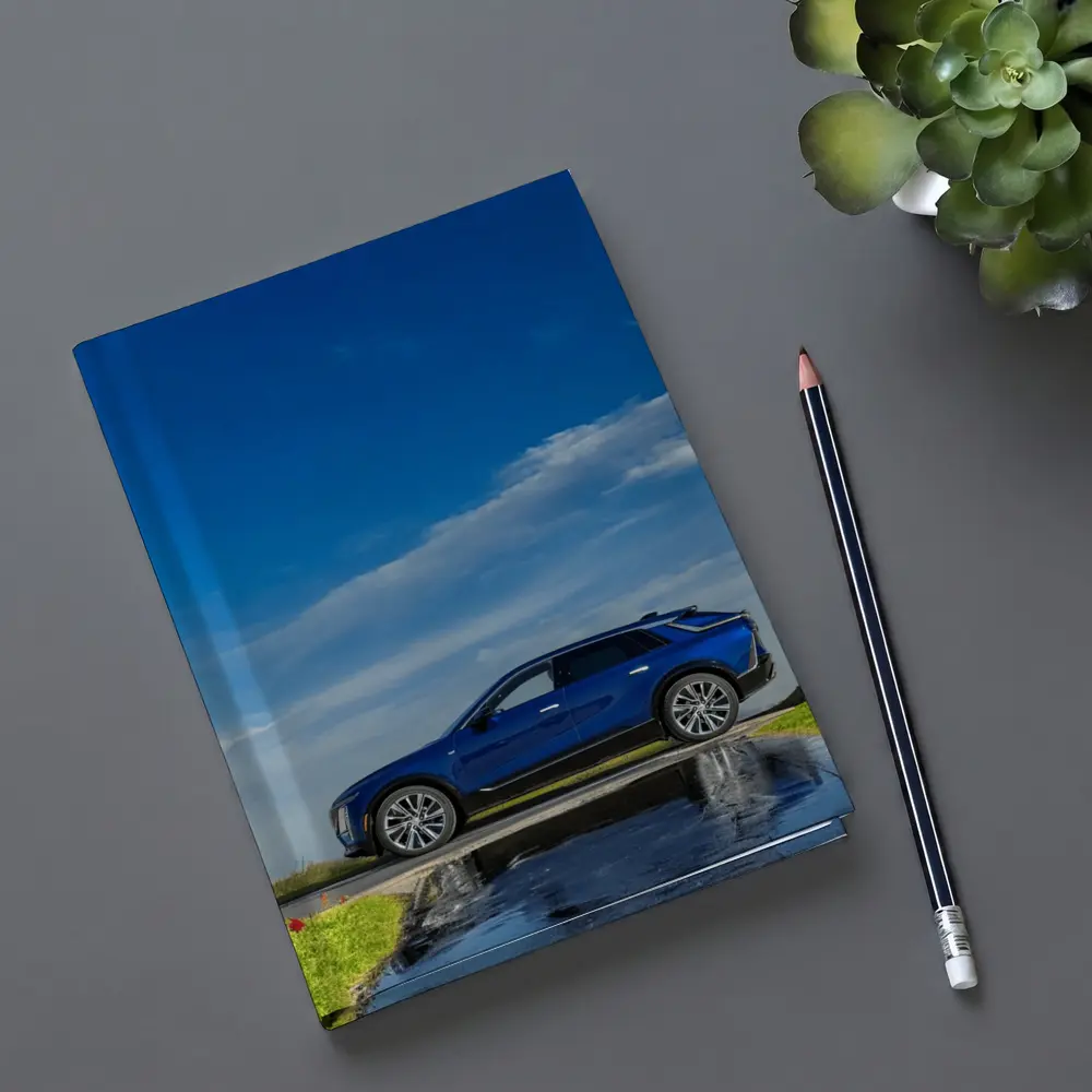Cadillac Lyriq Blue SUV Cloudy Sky – Notebooks