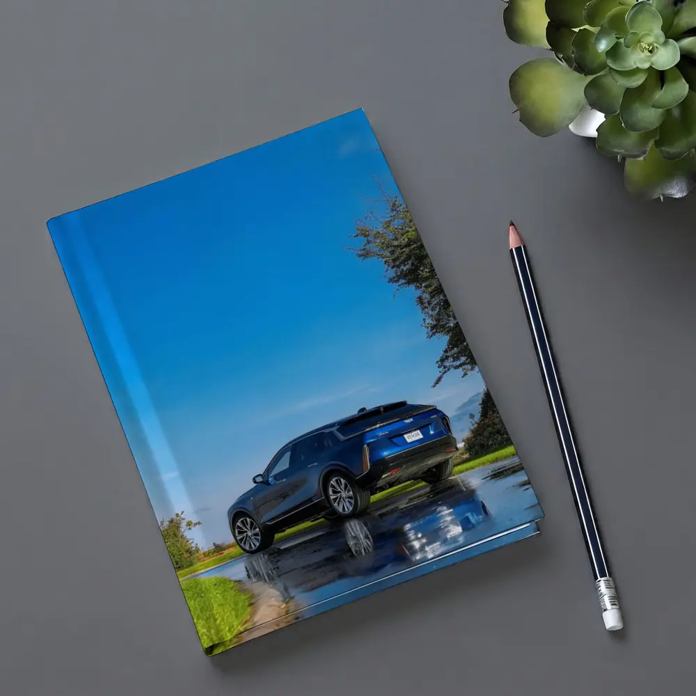Cadillac IQ Blue SUV Wet Road – Notebooks