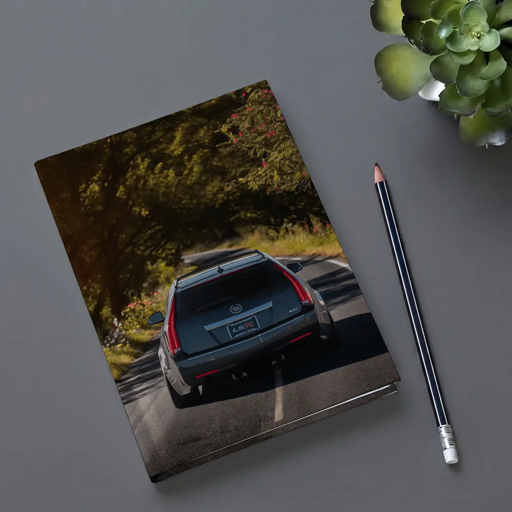 Cadillac CTS Wagon Driving Through Forest Road – Notebooks