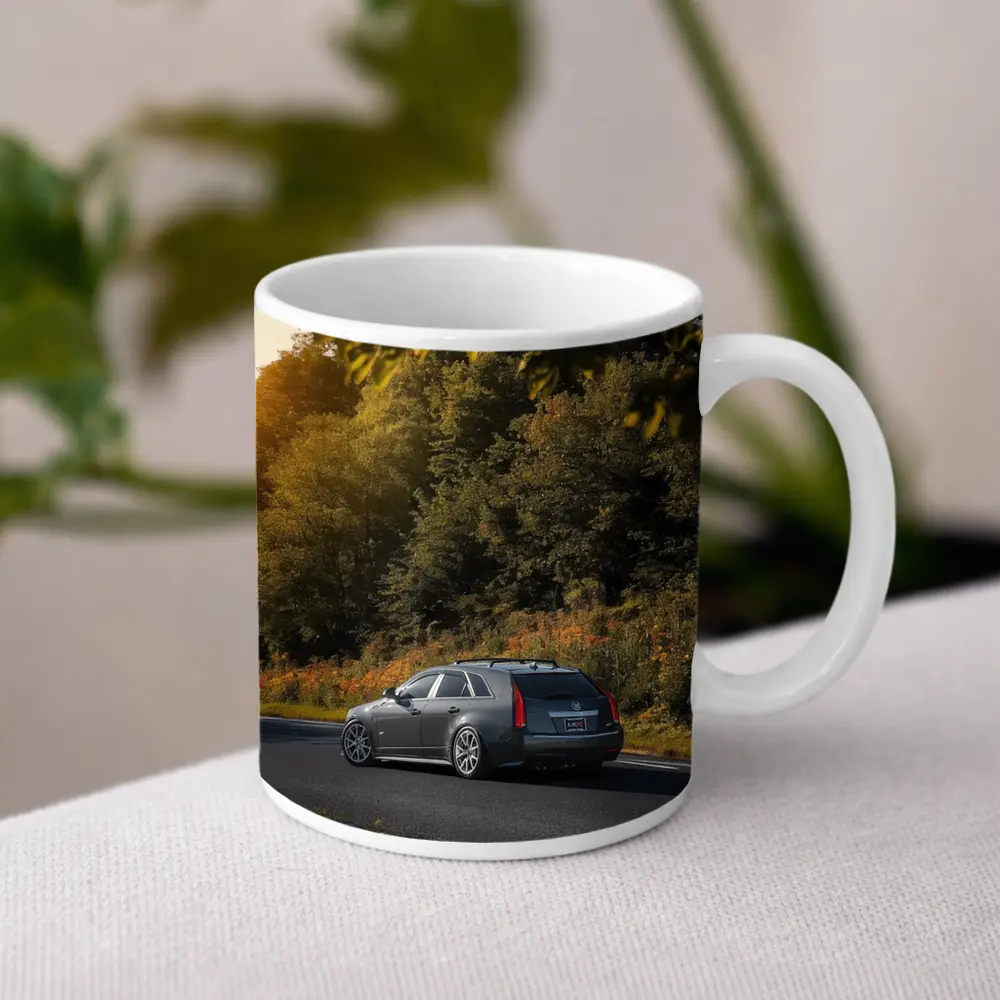Cadillac CTS Wagon Rolling Through Forest Road – Mugs