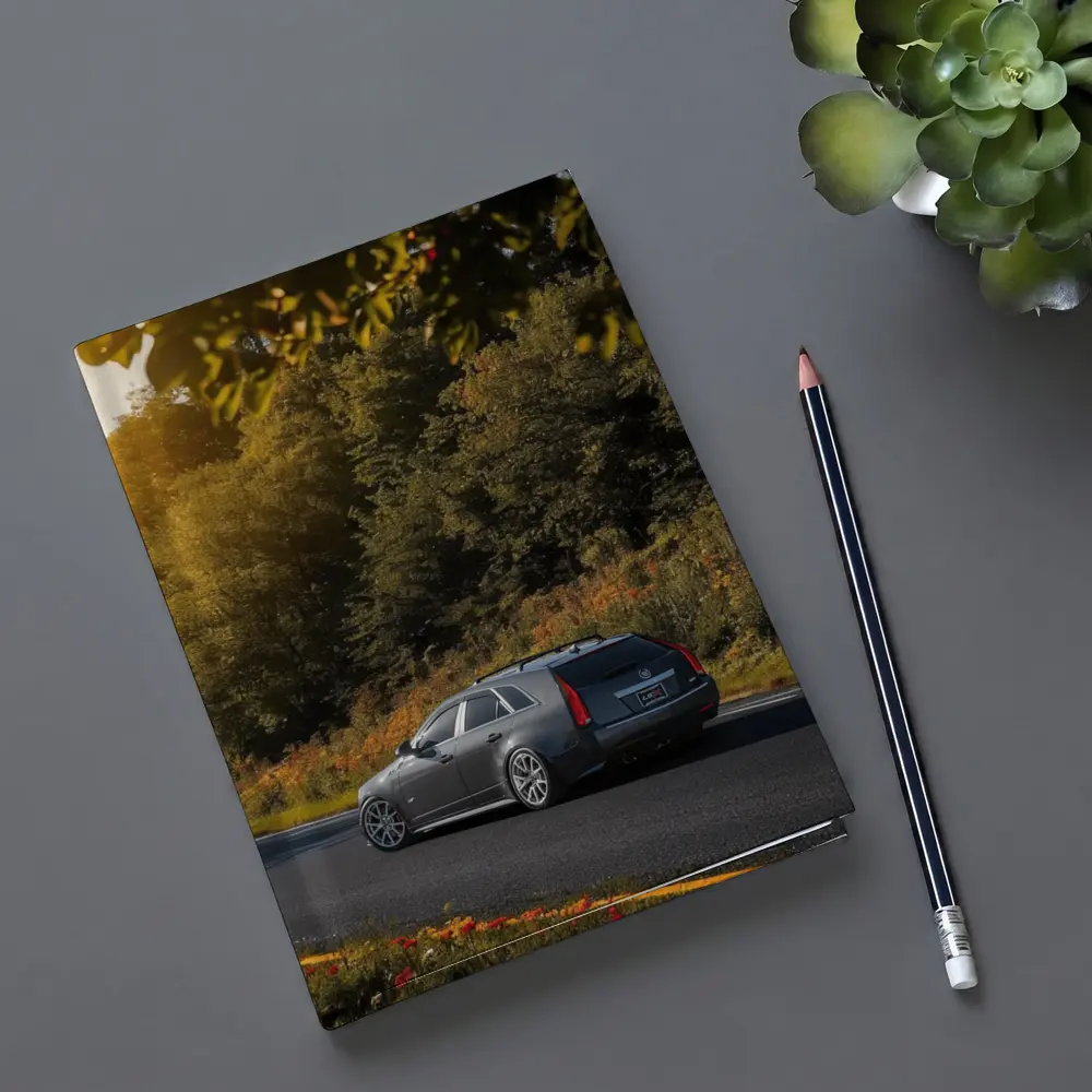 Cadillac CTS Wagon Rolling Through Forest Road – Notebooks
