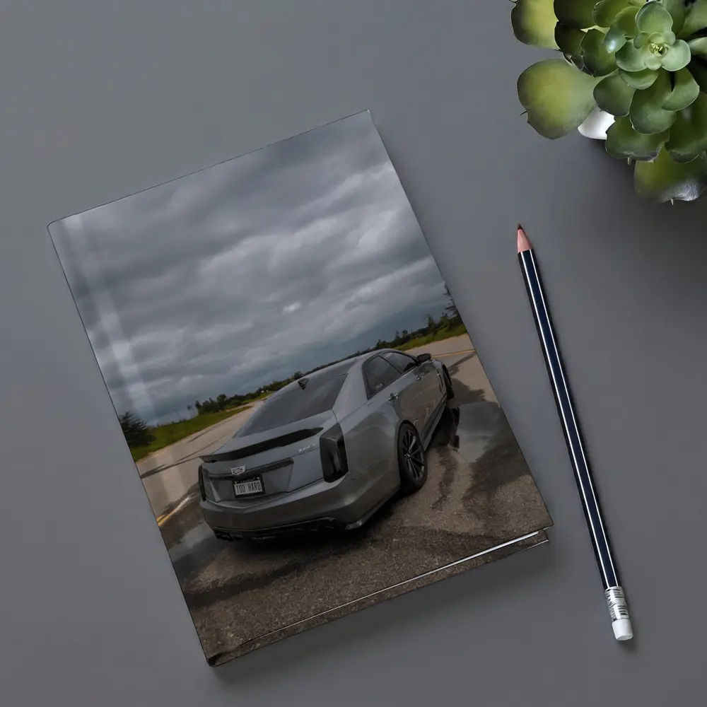 Cadillac CTS Sedan Gray Stormy Road – Notebooks