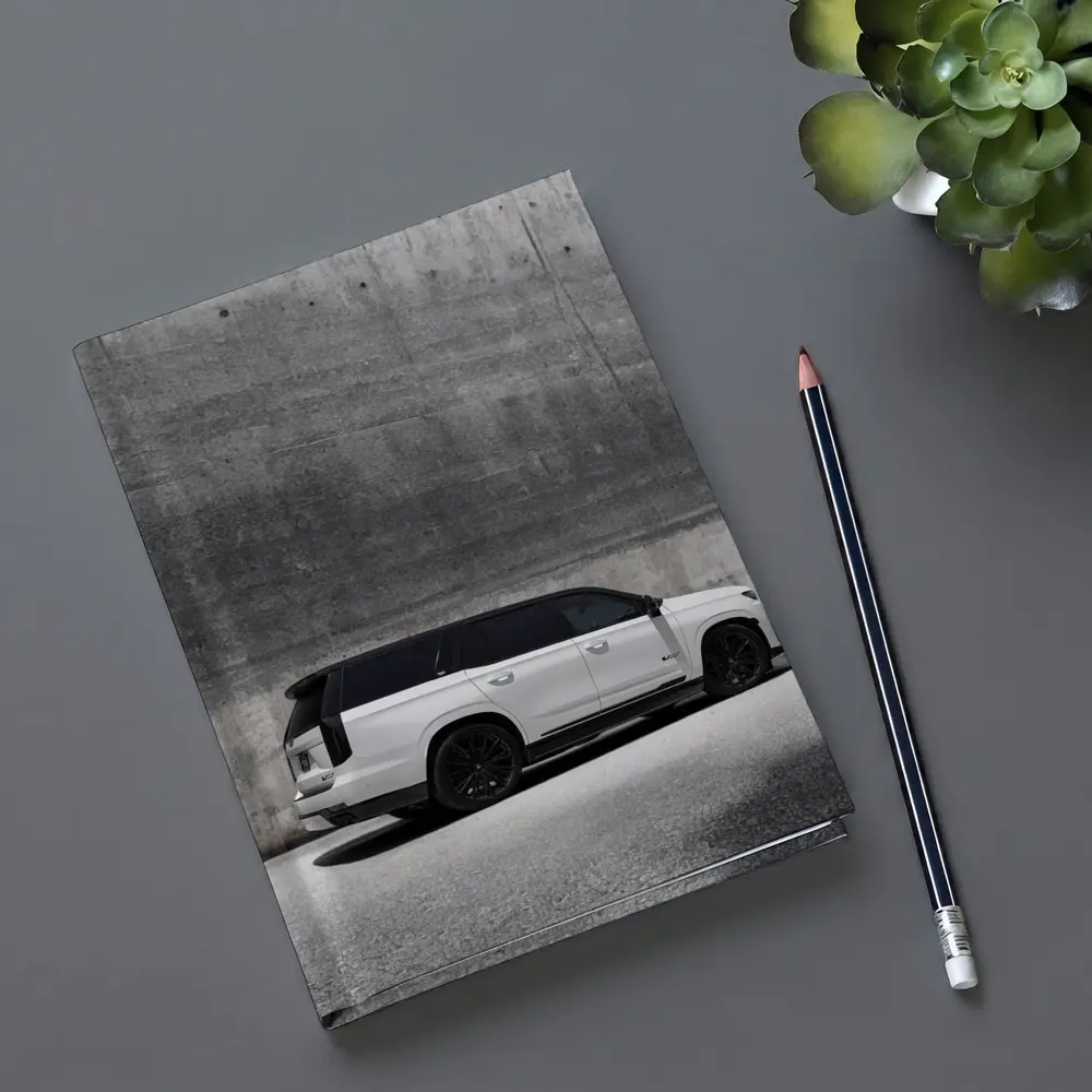 Cadillac Escalade White SUV Concrete Wall – Notebooks