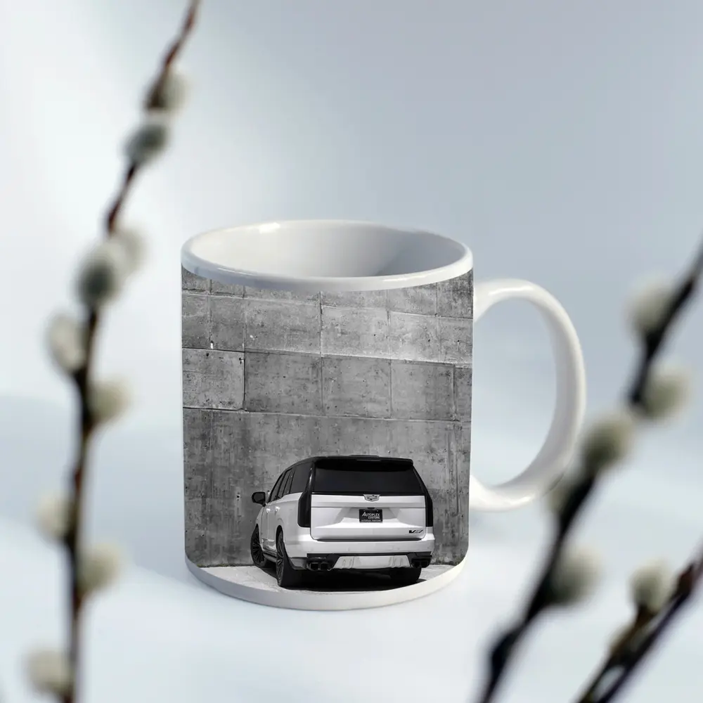 White Cadillac Escalade Against Concrete Wall – Mugs