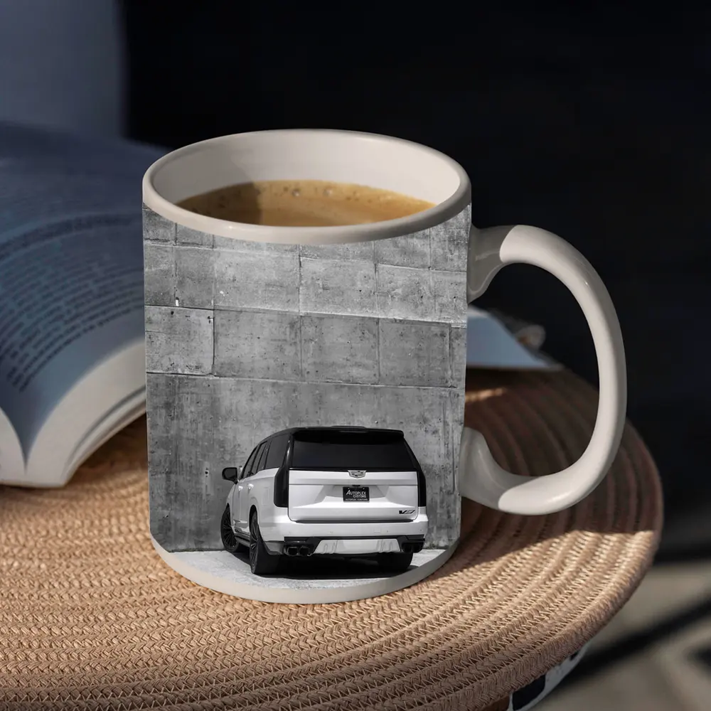 White Cadillac Escalade Against Concrete Wall – Mugs
