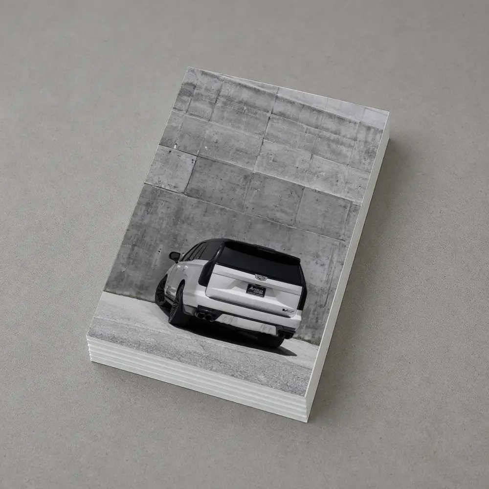 White Cadillac Escalade Against Concrete Wall – Postcards