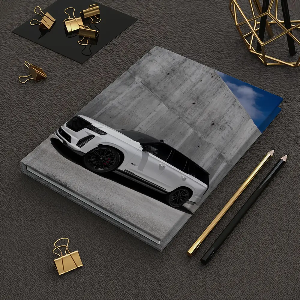 Cadillac Escalade White Against Concrete Wall – Notebooks