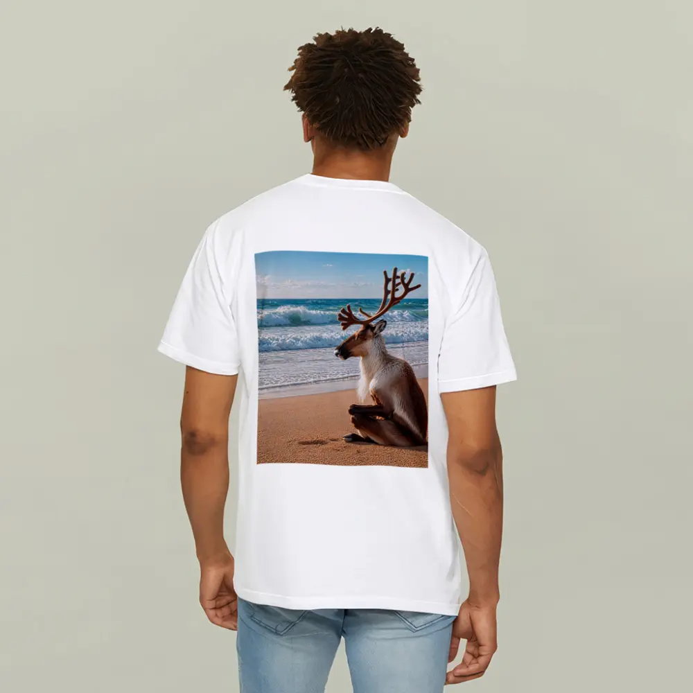 Caribou Sitting Peacefully on Sandy Beach – T-Shirts