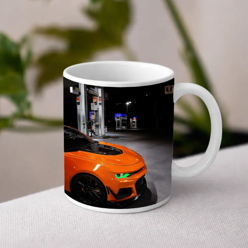 Chevrolet Camaro Orange At Night Gas Station – Mugs