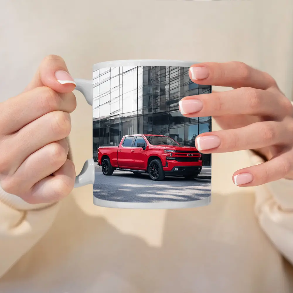 Red Chevrolet Silverado Parked by Glass Building – Mugs