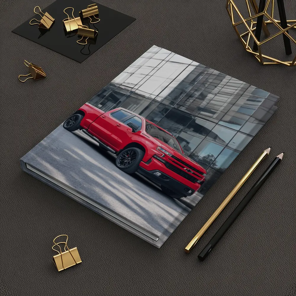 Red Chevrolet Silverado Parked by Glass Building – Notebooks