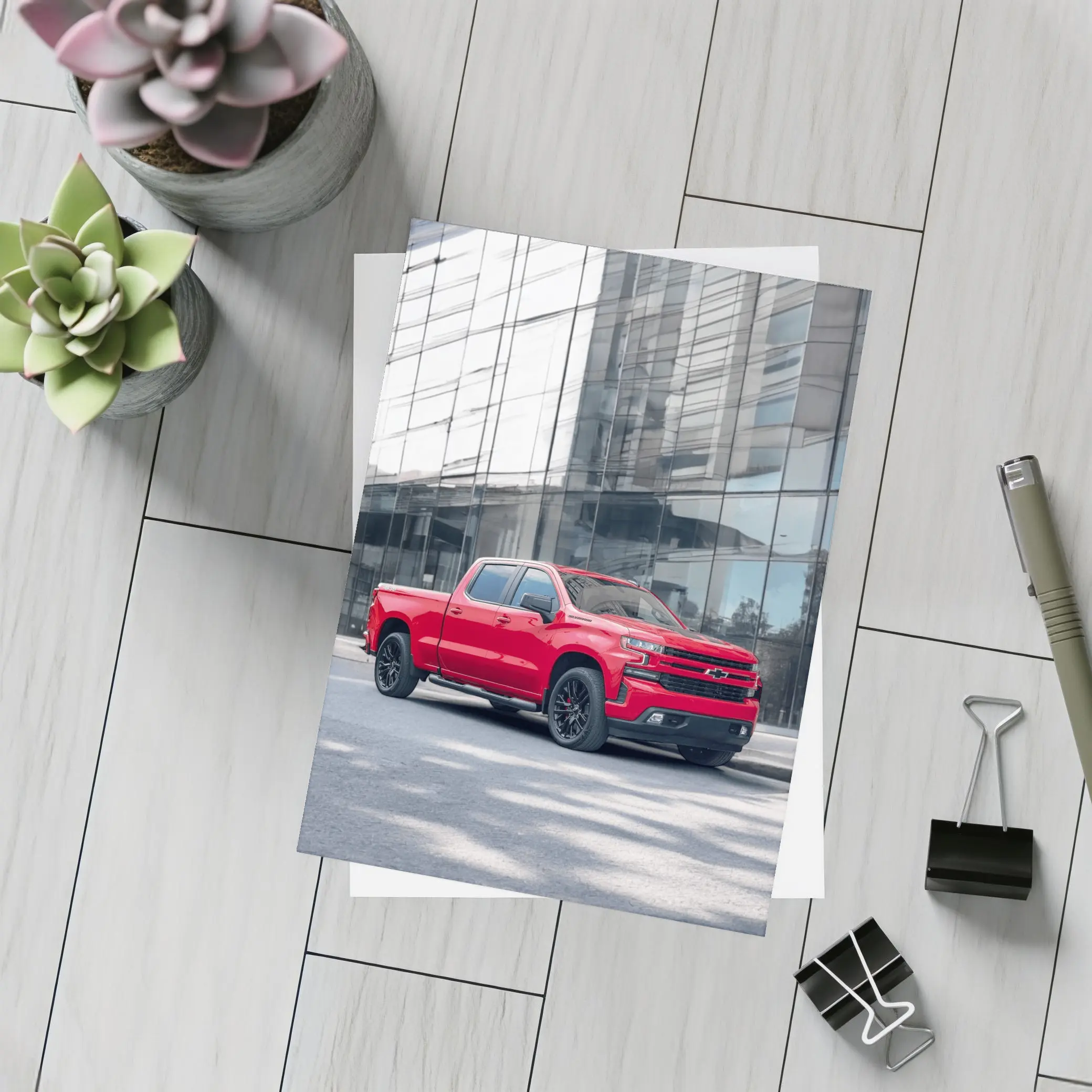 Red Chevrolet Silverado Parked by Glass Building – Postcards