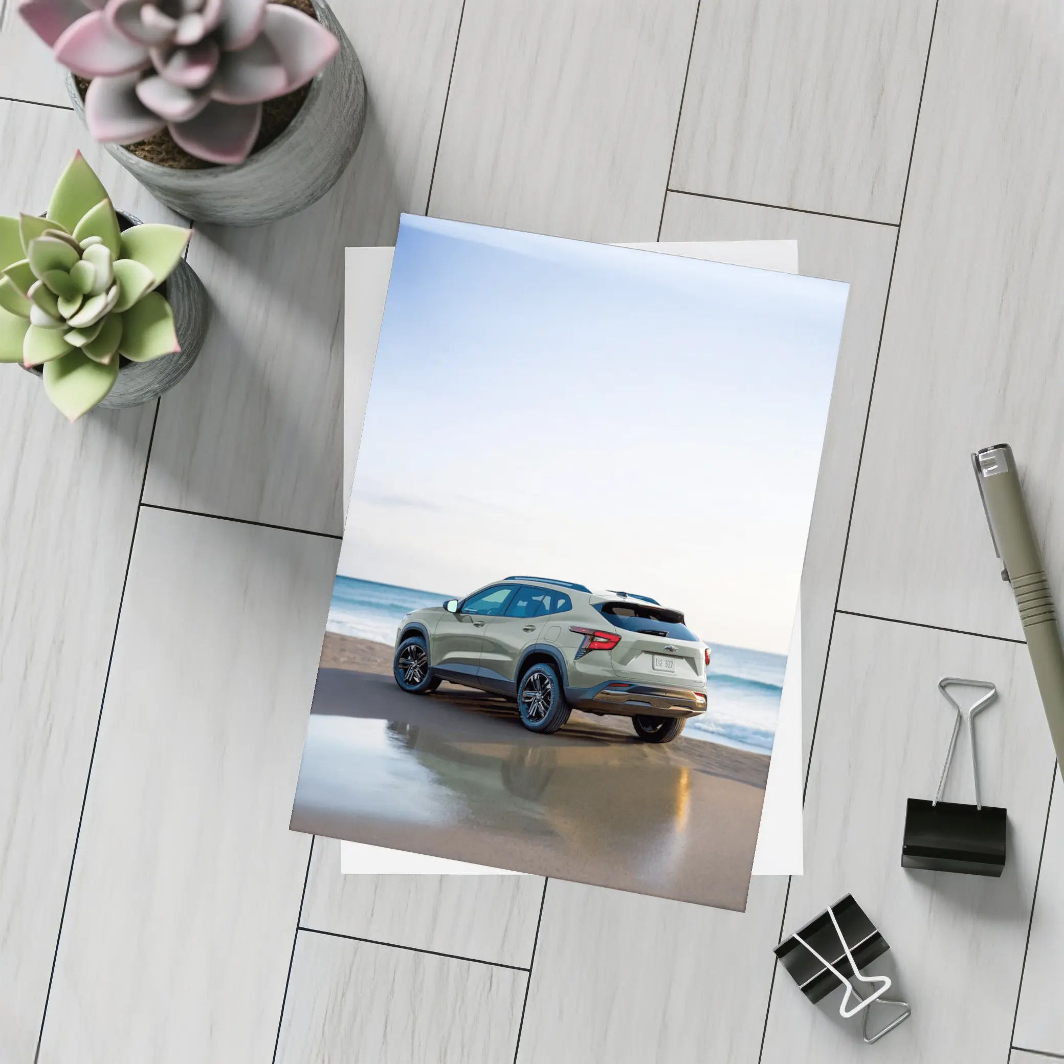Chevrolet Trax SUV Parked on Sandy Beach – Postcards