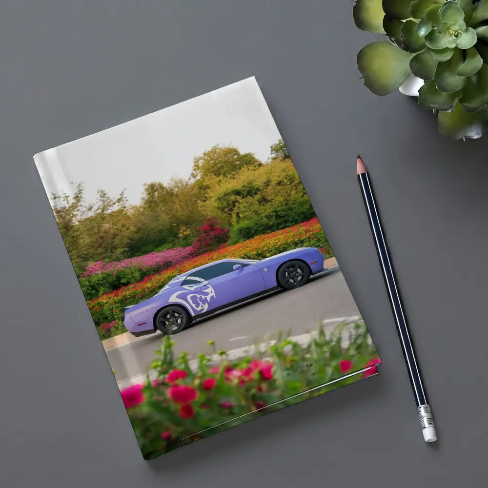Purple Dodge Challenger Parked Near Flowers – Notebooks