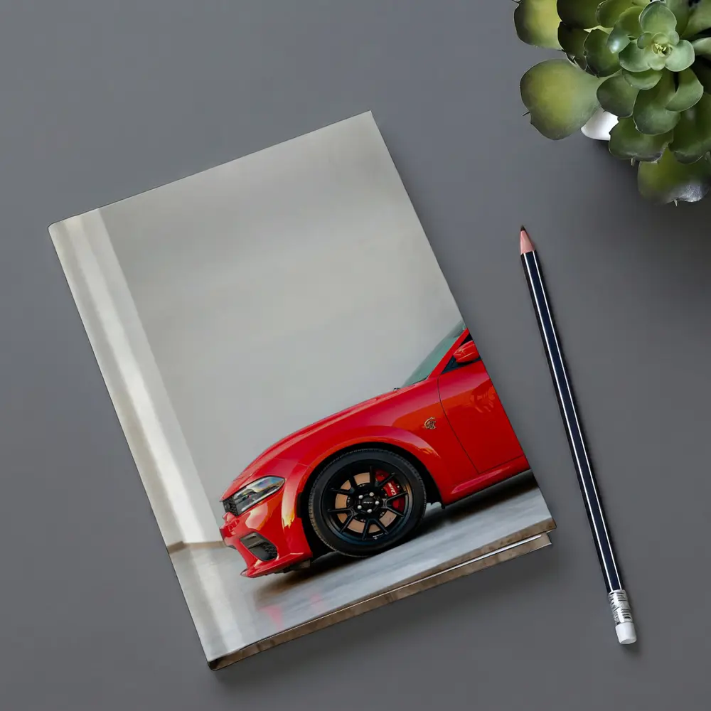 Red Dodge Charger Parked in Garage – Notebooks