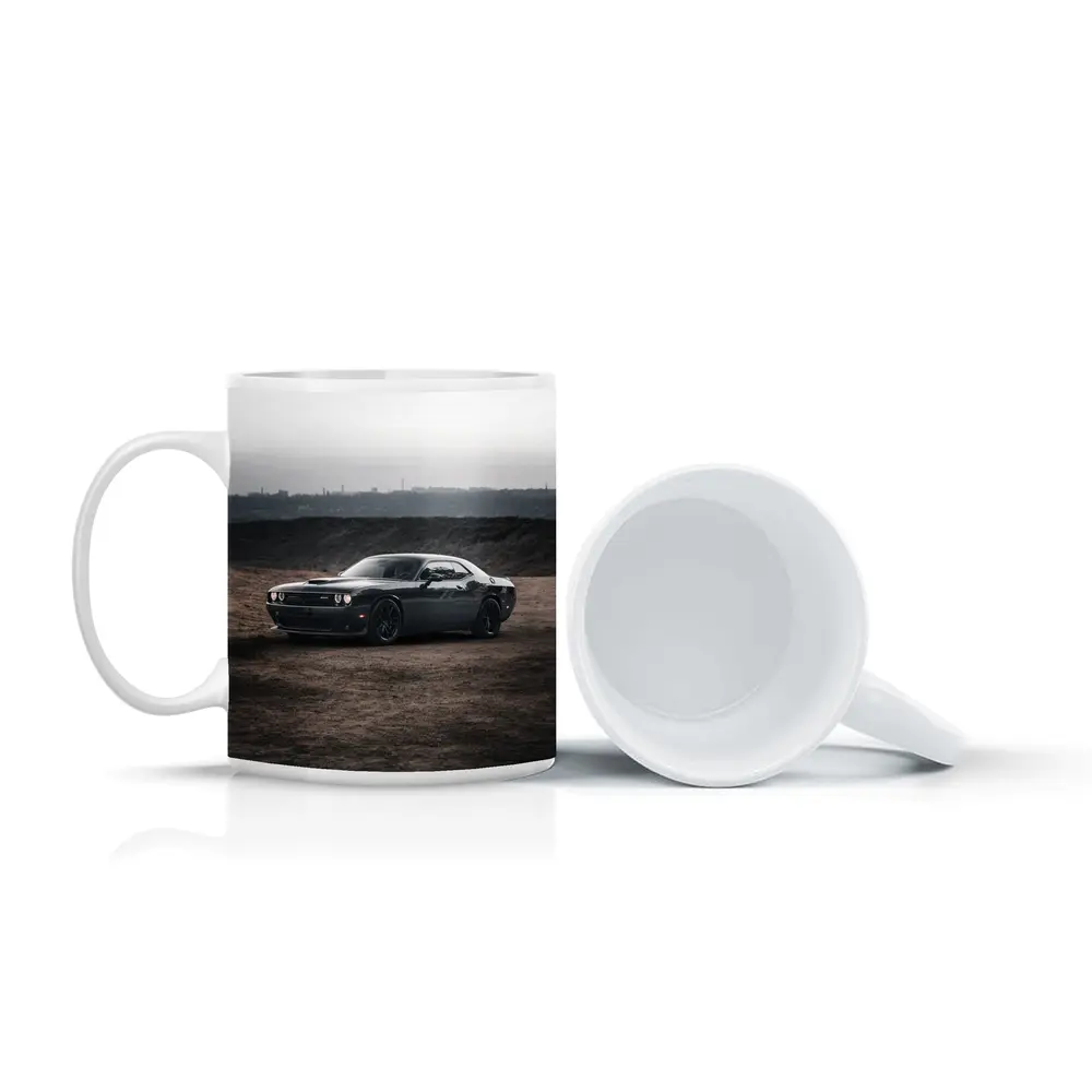 Black Dodge Challenger Parked on Dirt Ground – Mugs