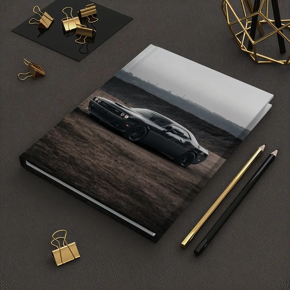 Black Dodge Challenger Parked on Dirt Ground – Notebooks