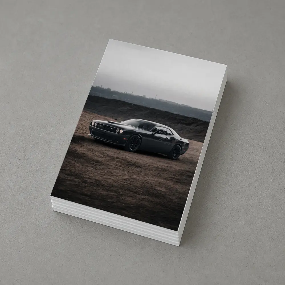 Black Dodge Challenger Parked on Dirt Ground – Postcards