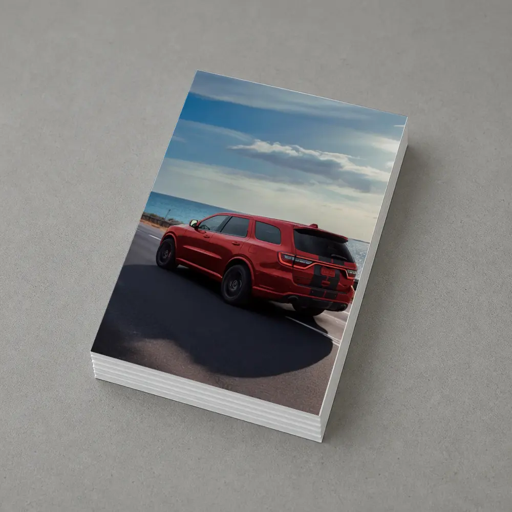 Red Dodge Durango Driving Along Coastal Road – Postcards
