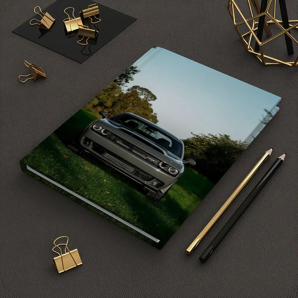 Dodge Challenger Parked on Green Grass – Notebooks