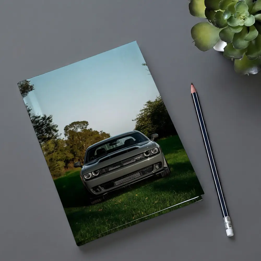 Dodge Challenger Parked on Green Grass – Notebooks