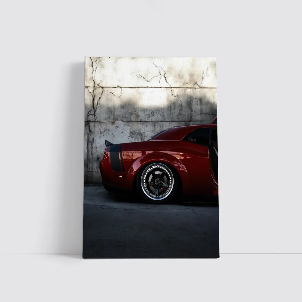 Red Dodge Challenger Parked Against Concrete Wall – Wall Art