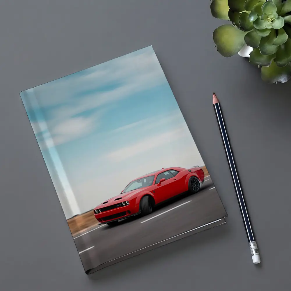 Red Dodge Challenger Speeding On Open Road – Notebooks