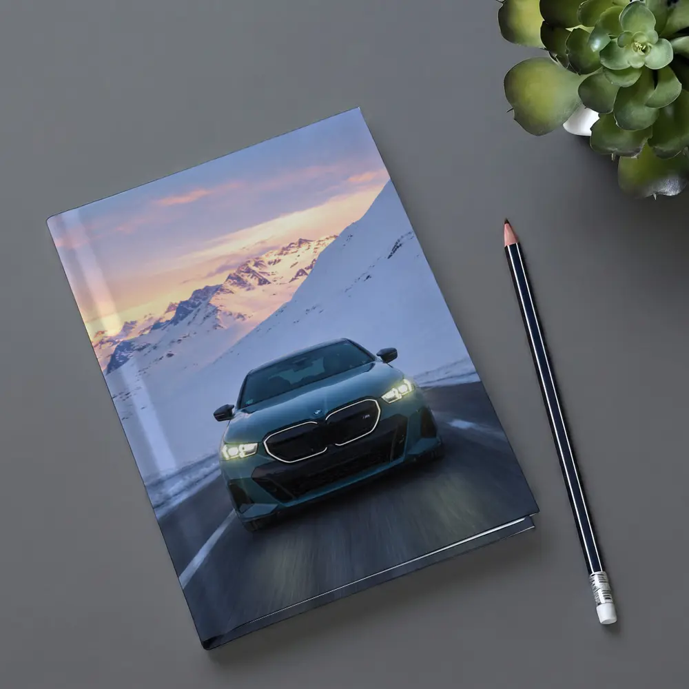 BMW i5 M60 Driving Snowy Mountain Road – Notebooks