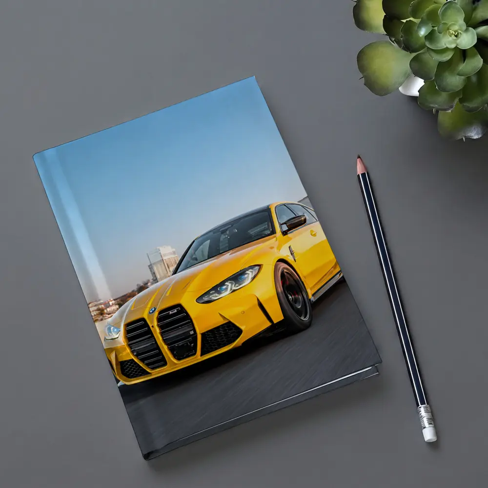 Yellow BMW M3 Speeding Through City Streets – Notebooks