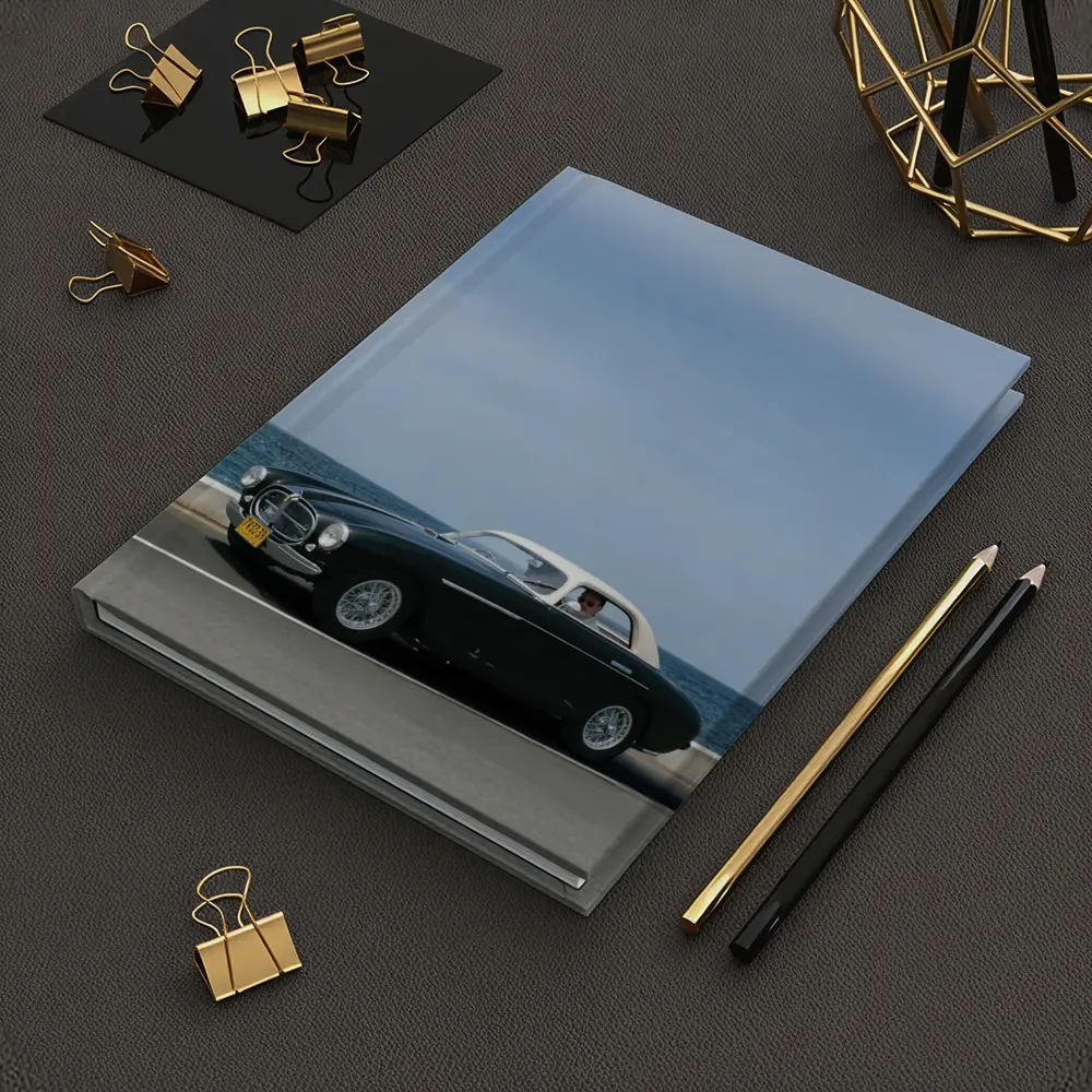 Classic Ferrari Coupe Driving Along Coastal Road – Notebooks