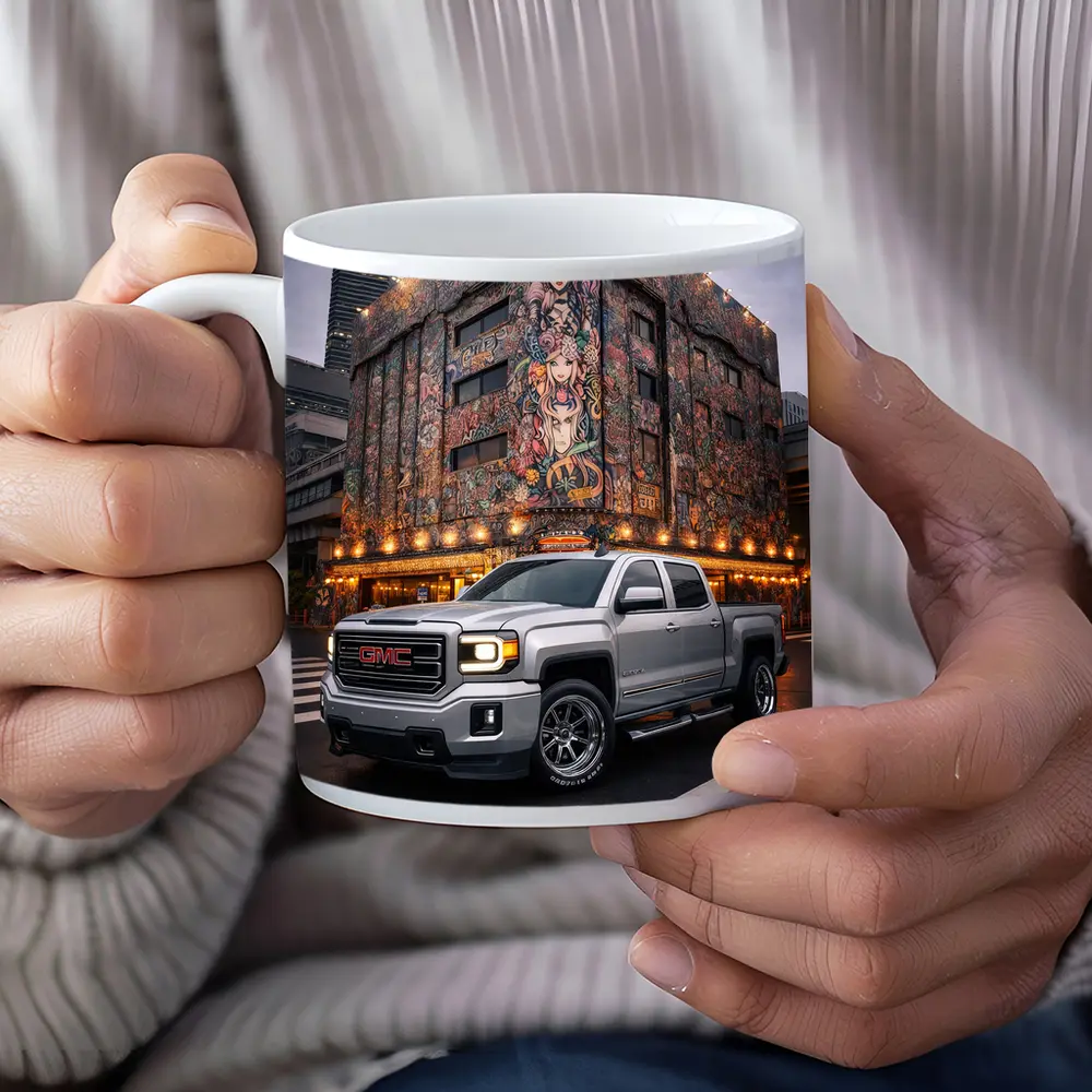 GMC Sierra Truck Parked Near Mural Building – Mugs