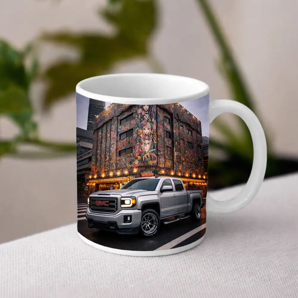 GMC Sierra Truck Parked Near Mural Building – Mugs