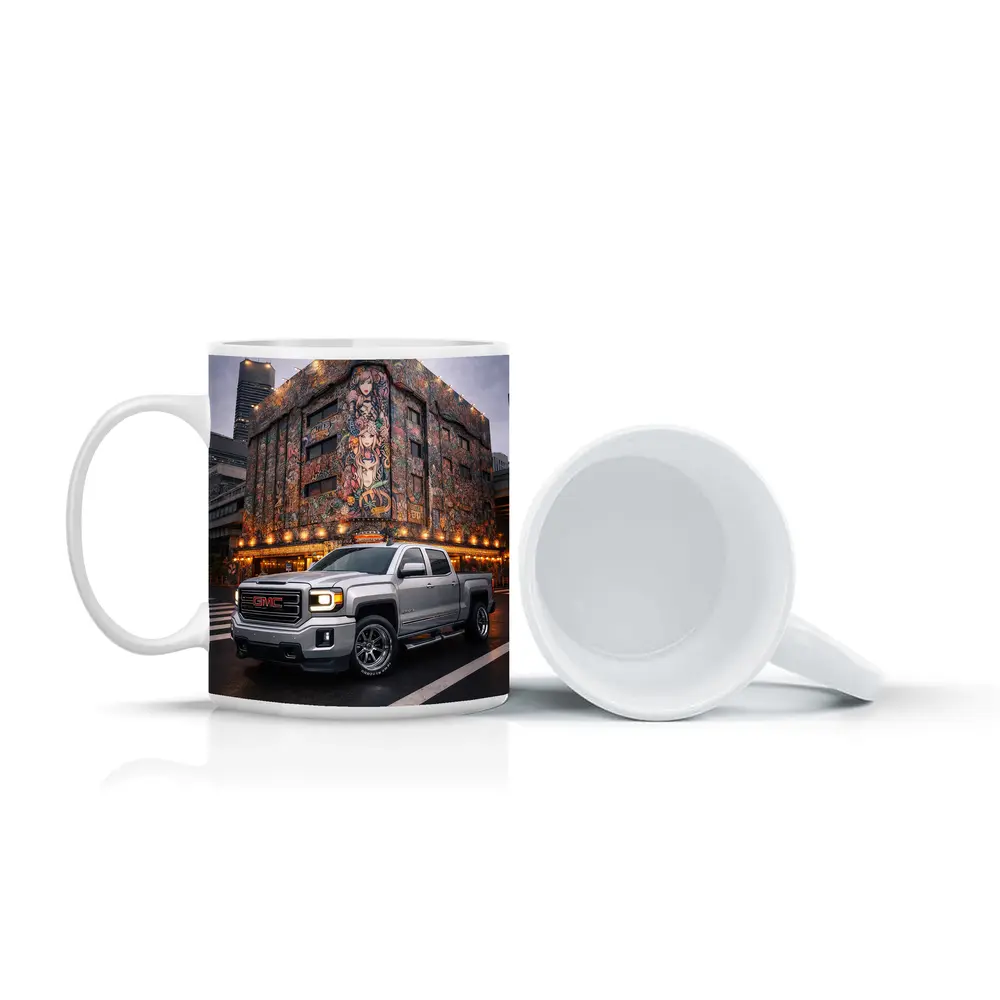 GMC Sierra Truck Parked Near Mural Building – Mugs